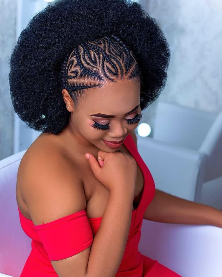 Cornrows braided upward into a patterned crown